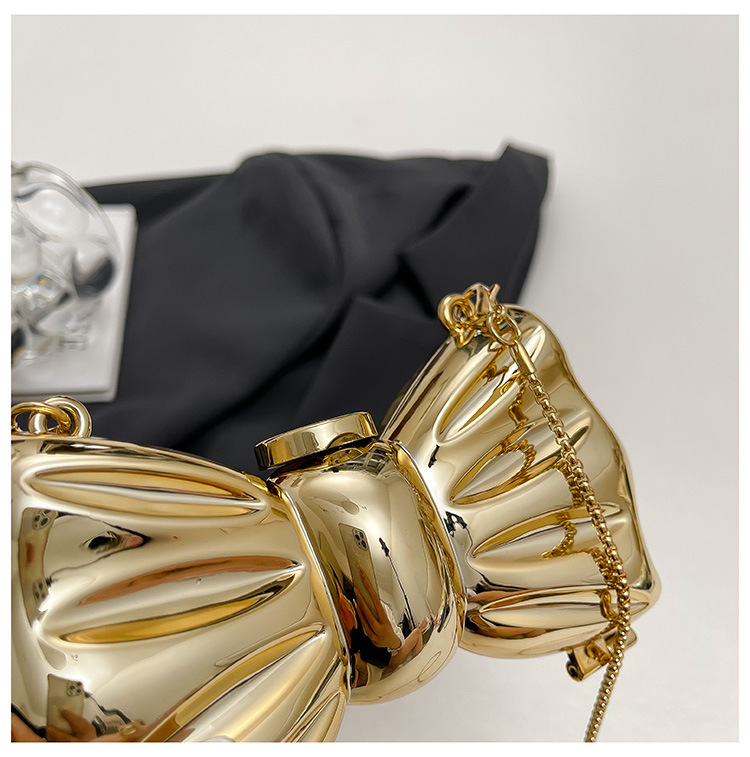 Glänzende goldene Metall-Schle – Wedding Vendor Bewertung und Preis